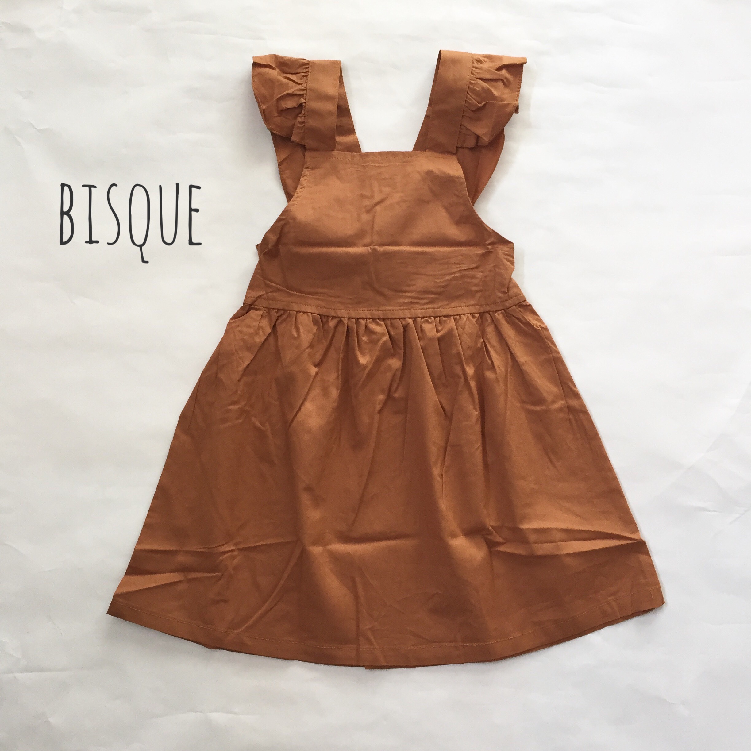リボンエプロンワンピース 韓国子供服 Bisque びすく