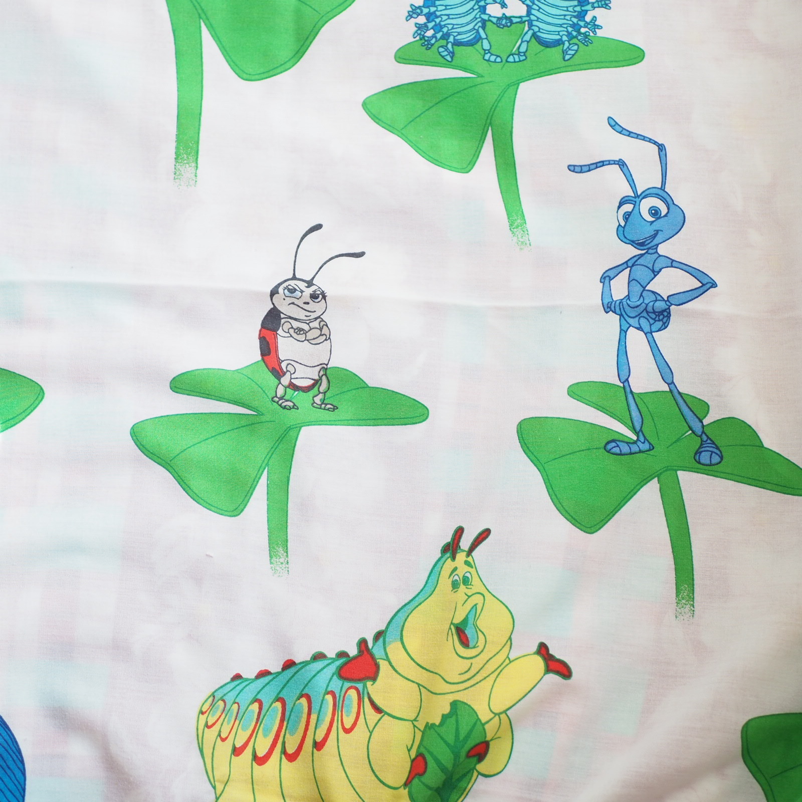 ディズニー生地 バグズライフのビンテージシーツ Alleys Curio