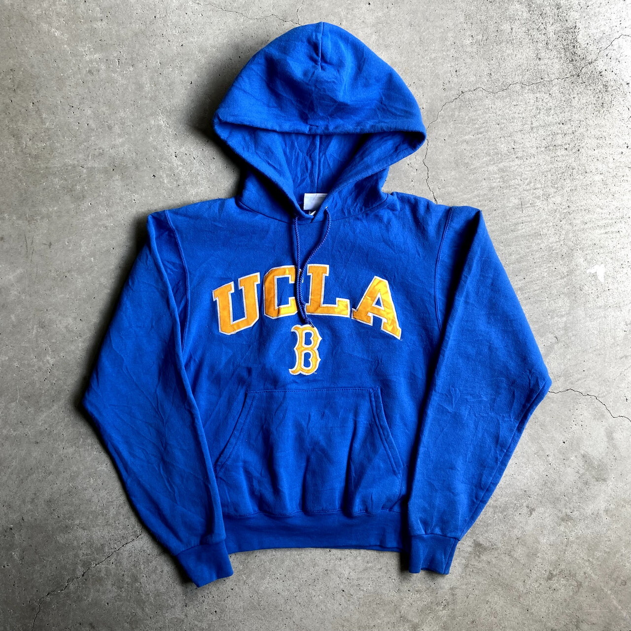 Champion チャンピオン Ucla Bruins カレッジチームロゴ ワッペン プルオーバーパーカー メンズxs レディース 古着 スウェットパーカー ブルー 青色 パーカー Cave 古着屋 公式 古着通販サイト
