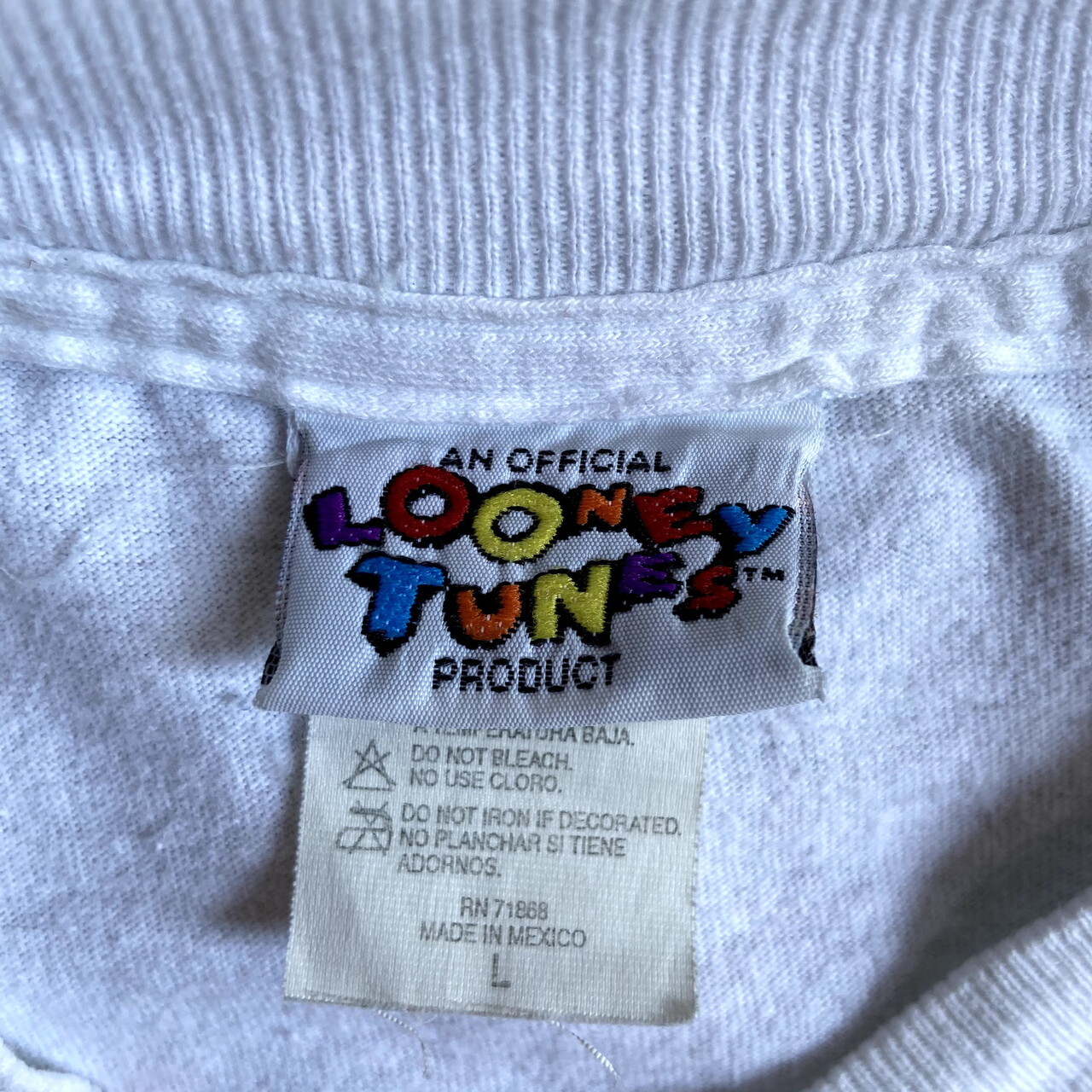 90年代 USA製 ルーニーテューンズ トゥイーティー フラワー柄 オーバープリント キャラクタープリントTシャツ メンズL レディースXL相当 古着  LOONEY TUNES 90s ビンテージ ヴィンテージ ラメ入りプリント ホワイト 白【Tシャツ】【SA2107】  cave 