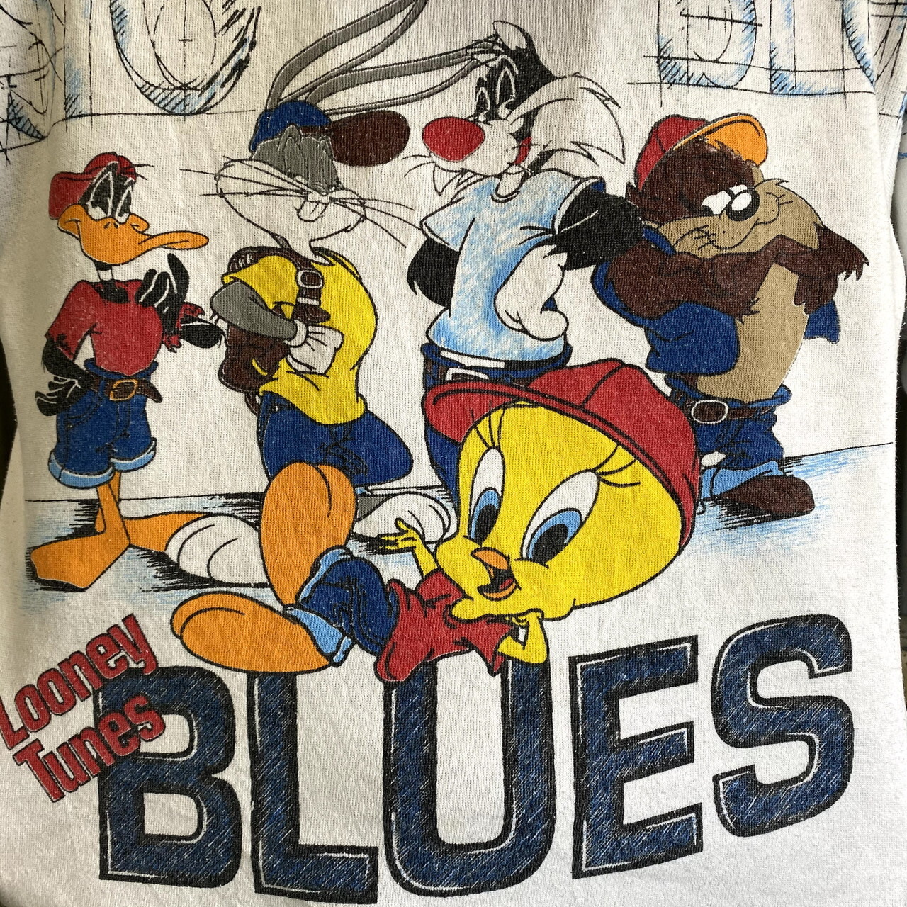 90年代 Looney Tunes Blues ルーニーテューンズ ブルース キャラクタープリントスウェット メンズm レディースl相当 古着 Warner Bros 90s ビンテージ ヴィンテージ トレーナー ホワイト 白 スウェット Cave 古着屋 公式 古着通販サイト