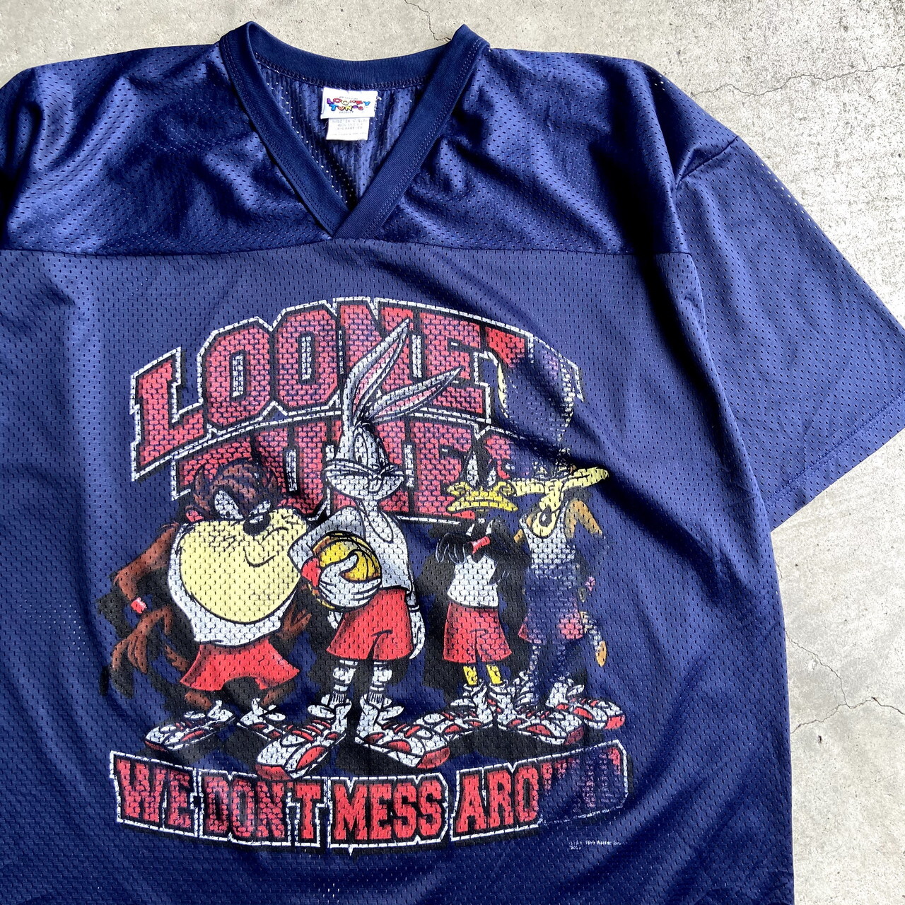 90年代 Usa製 Looney Tunes ルーニーテューンズ メッシュ キャラクタープリント フットボールシャツ メンズxl 古着 90s ビンテージ ヴィンテージ メッシュシャツ ネイビー 紺色 ゲームシャツ Cave 古着屋 公式 古着通販サイト