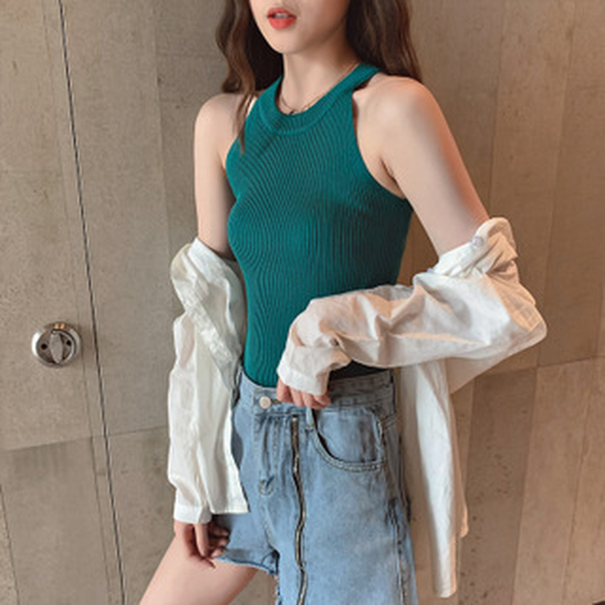 直接夏の新しい吊り首スリムニットセーター女性無地野生セクシーなスリングノースリーブプルオーバートップ サマー 夏物 ソリッドカラー ワイルド