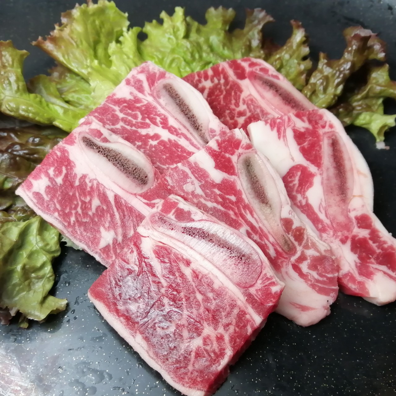 骨付きカルビ 焼肉プサン 鳥栖本店