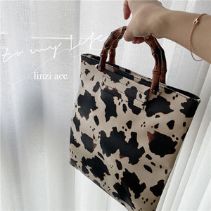 牛柄 スクエアバッグ バンブーハンドル アニマル柄 バッグ Aerg アーグ レディースアパレル通販サイト