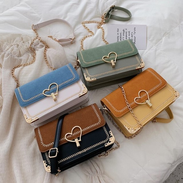 ハート型リングバックルデザインチェーン付ショルダーバッグ ガーリー カジュアル 可愛い お洒落 お出かけ デート ４カラー バッグ トゥーザフューチャー