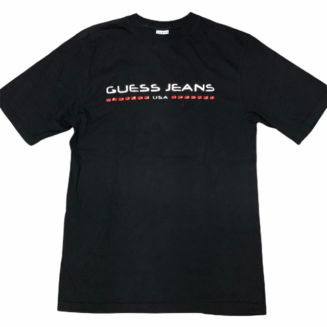 Guess Jeans ゲス ジーンズ Usa製 ロゴマーク入り 半袖tシャツ 黒 M 都町の古着屋 Charkha Bazaar チャルカバザール