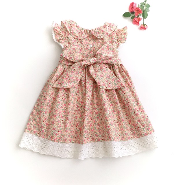 フリル襟スモッキングワンピース パステルピンクローズ リボンミモレ丈 Heart Spring スモッキングワンピースと可愛い子供服のお店