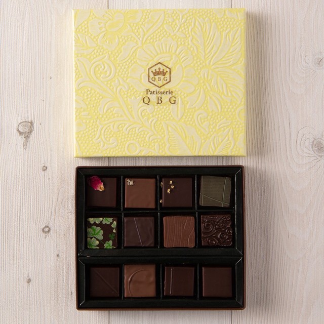 ボタニカルハニーショコラ12個入 はちみつ チョコ ボンボン ハーブ スパイス ボタニカル ローズフレーズデボア エルダーフラワー レモングラス ミント カルダモン ラベンダー ジュニパー イチジク たなかまる 田中丸 美味しい Patisserie Qbg By Hirofumi Tanakamaru