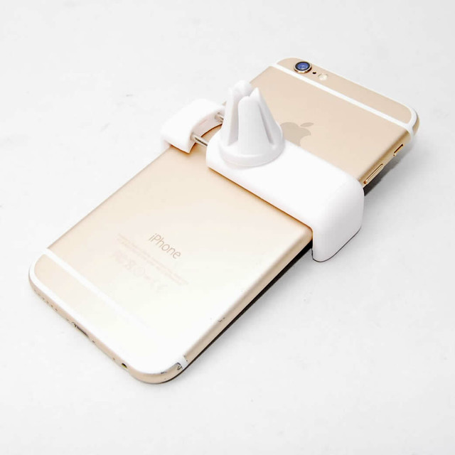 送料無料 車用 スマホホルダー ホワイト エアコン吹き出し口に簡単設置 携帯ホルダー 車内 自動車 Iphone 車 スタンド 白 Shop Tsukimi