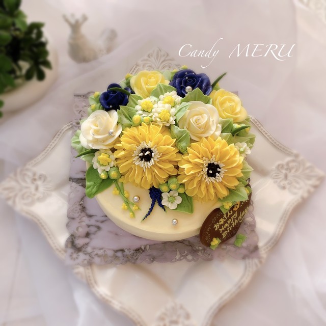 黄色いリアルフラワーのケーキ チーズケーキ味 Candy Meru アニバーサリーケーキショップ
