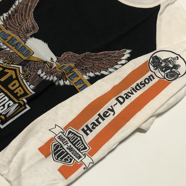 70 S Harley Davidson イーグル バー シールド 袖ハーレーバイクプリント ロングスリーブ 黒 白 ツートン カナダ製 T Shirts Dead Stock L ヴィンテージ古着 アンティーク商品取扱い Black Smith ブラックスミス ミッドセンチュリー 昭和アンティーク