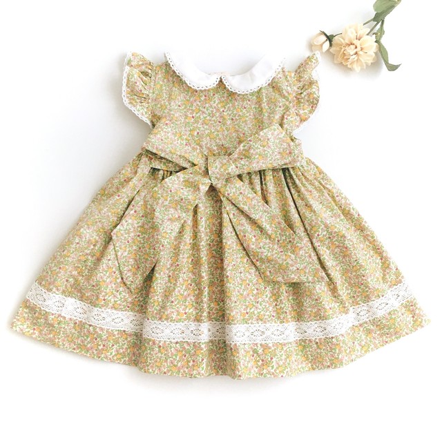 スモッキングワンピース パステルイエローローズ ピンクリボン フロントボタン Heart Spring スモッキングワンピースと可愛い子供服