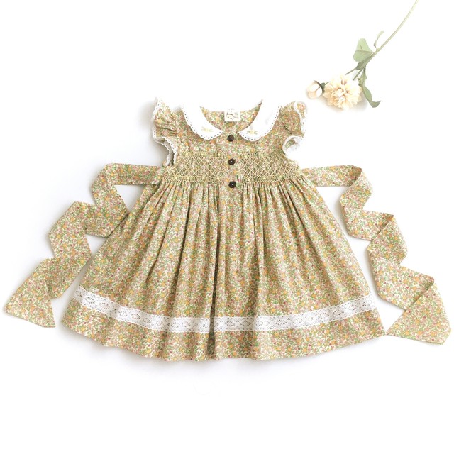 在庫110 スモッキングワンピース パステルイエローローズ ピンクリボン フロントボタン Heart Spring スモッキングワンピース と可愛い子供服