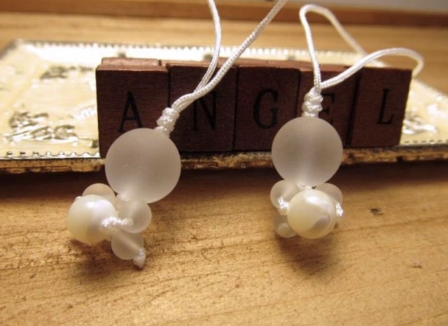 子育て 子宝のお守り 新作 水晶赤ちゃんストラップ 水晶babyがマザーオブパールを抱えています 月香館 女神のリリス屋 光の渦巻き