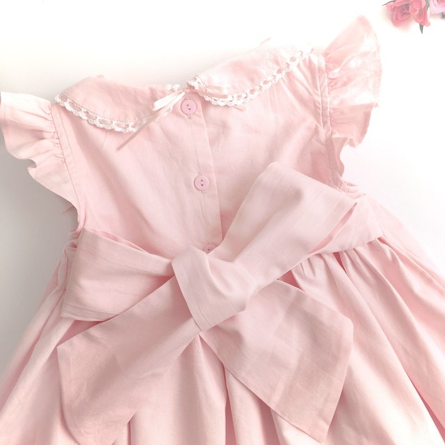 在庫130 スモッキングワンピース ベビーピンク リボンレース ワンピース Heart Spring スモッキングワンピースと可愛い子供服