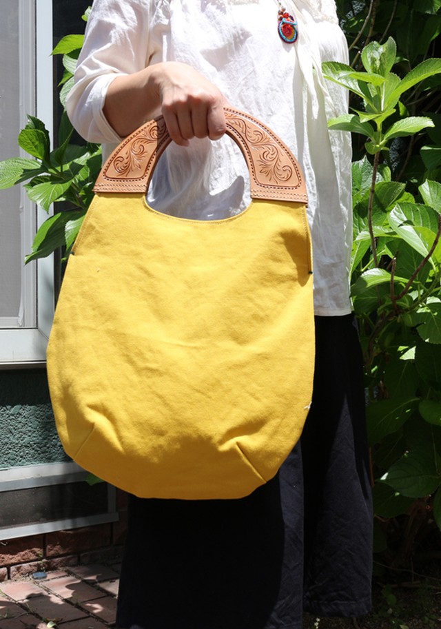 帆布とヌメ革のたまごトートバッグ イエロー 持ち手カービング Art Bali