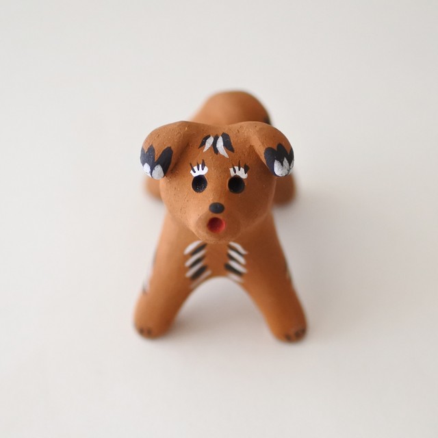 カルゴポリ土人形 茶色い犬 Mokuji
