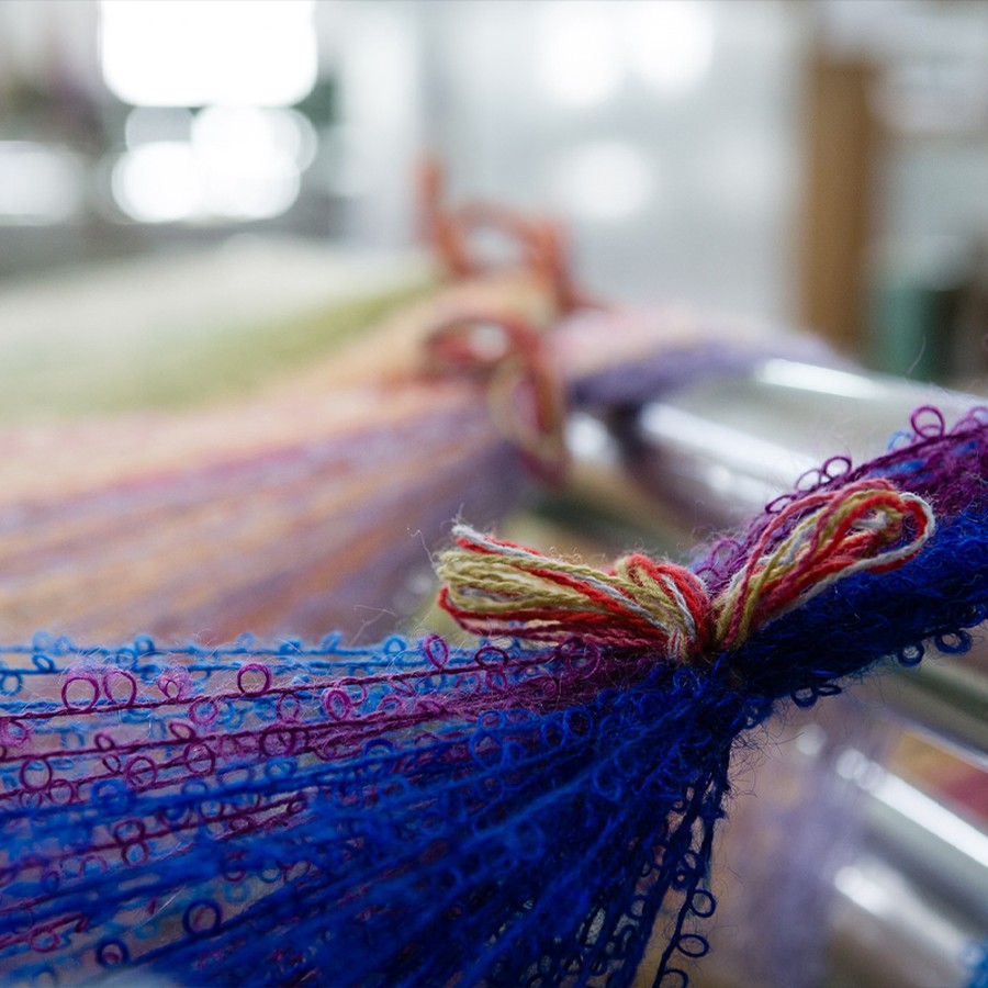 使用する原糸は、市場でも優れた品質で、インターナショナルウールセクレタリアからもバックアップを受ける